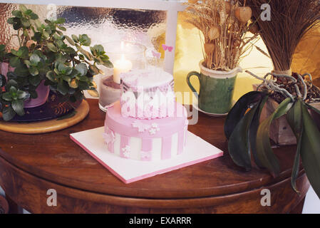 Birthday cake decorated with fondant butterflies Stock Photo