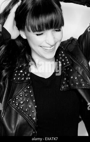 laughing young woman, b/w, portrait, Stock Photo