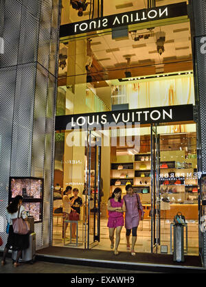Two Chinese ladies carry Louis Vuitton handbags at Beijing Scitech Premium  Outlet Mall in Beijing, China. 15-May-2010 Stock Photo - Alamy