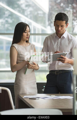 Engineers collaborating on project Stock Photo