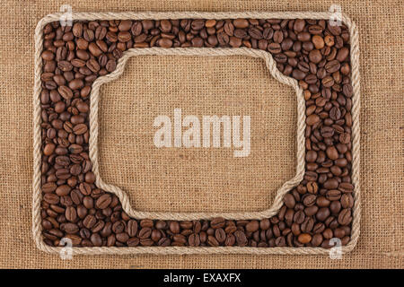 Two frames made of rope with  coffee  beans on sackcloth, as background, texture Stock Photo