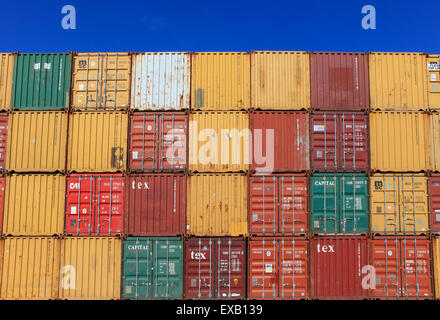 Container Brand/color Various brands and colors of shipping containers stacked Stock Photo ...