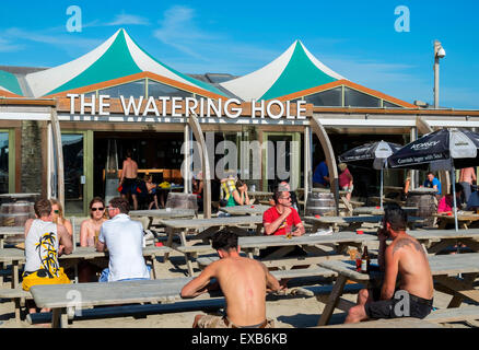 The Watering Hole bar on the beach at Perranporth, Cornwall, UK Stock Photo