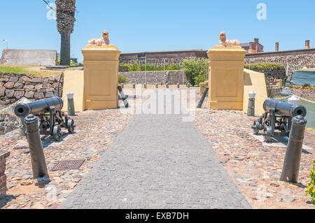 Historic cannons and lions guarding the main entrance to the Castle of Good Hope Stock Photo