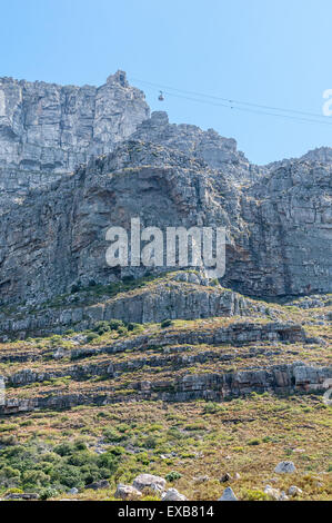 View of Table Mountain and upper cable station in Cape Town. A cable car is visible. The cableway was opened on October 4, 1929 Stock Photo