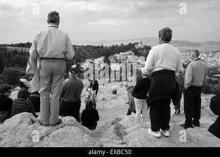 Tourists on the rock of Areopagos, Athens, Greece Stock Photo