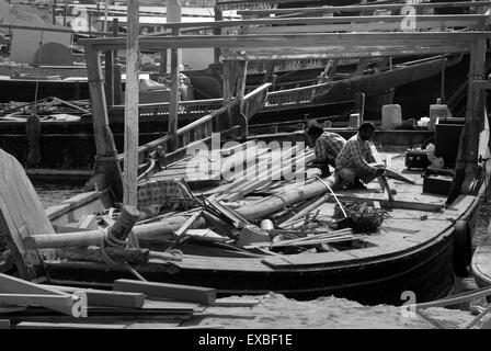 Traditional arab dhow being repaired, Doha, Qatar Stock Photo