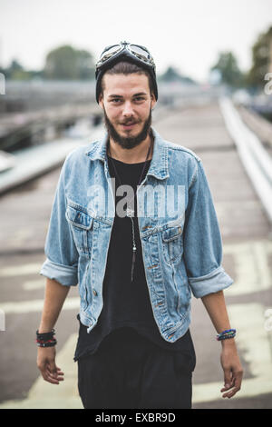 young handsome bearded hipster man in the city Stock Photo