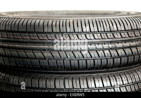 Close up detail of the tread of a pair of new winter tires for enhanced traction and grip in low temperatures Stock Photo