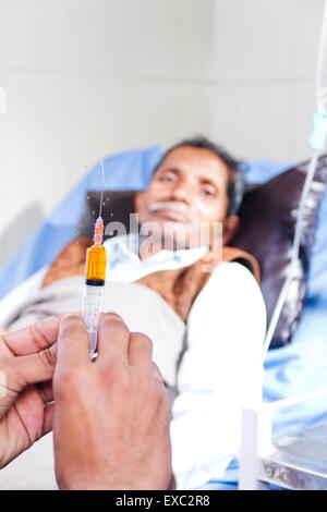 indian doctor hospital Patient Treatment Injection Stock Photo