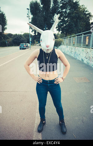 Rabbit Mask Woman Abusrd Unreal In The City Stock Photo - Alamy