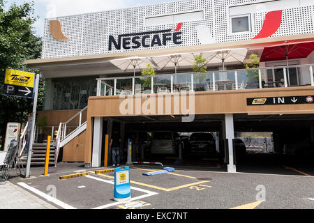 Tokyo, Japan. 11th July, 2015. A view of the NESCAFE coffee-shop in Harajuku area on July 11, 2015, Tokyo, Japan. Six robots are programmed to interact with people while introducing the Nescafe products during a special event ''The world? Future cafe by NESCAFE with Pepper'' on Saturday July 11th. The store will continue to employ two robots as regular staff to introduce the shop's products and services. Credit:  Rodrigo Reyes Marin/AFLO/Alamy Live News Stock Photo