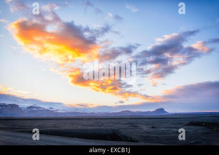 Sunset over the black sands wastelands of Iceland Stock Photo