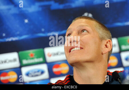 FILE - A file picture dated 31 March 2014 shows Munich's Bastian Schweinsteiger looking up as he attends a press conference in Manchester, Great Britain. Germany captain Bastian Schweinsteiger is leaving Bayern Munich for Manchester United, Munich chairman Karl-Heinz Rummenigge confirmed on 11 July 2015. Photo: ANDREAS GEBERT/dpa Stock Photo
