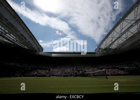 London, UK. 11th July, 2015. Serena Williams of the United States competes with Garbine Muguruza of Spain during the women's singles final at the 2015 Wimbledon Championships in Wimbledon, southwest London, Britain on July 11, 2015. Serena Williams won 2-0. This is the center court. Credit:  Han Yan/Xinhua/Alamy Live News Stock Photo