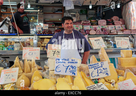 Cheese seller at Catania street market, Catania town, Sicily, Italy Stock Photo