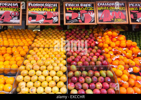 Fresh fruit on-sale at a grocery market street display in New York City. Stock Photo