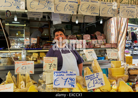 Cheese seller at Catania street market, Catania town, Sicily, Italy Stock Photo