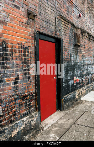 Old Red Door Brick Wall Stock Photo