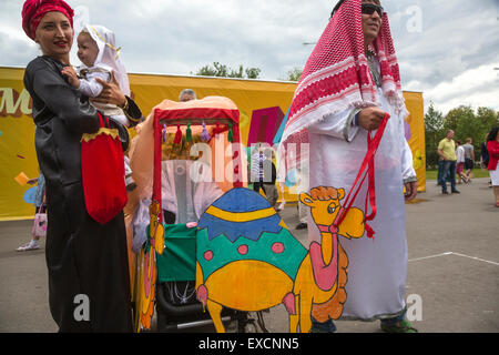 Moscow, Russia. 11th July, 2015. Participants of a Baby Stroller Parade in Gorky Park during the celebration of the Day of Family, Love and Fidelity in Moscow, Russia Credit:  Nikolay Vinokurov/Alamy Live News Stock Photo