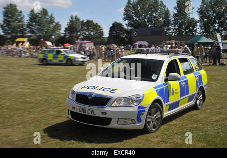 Maidstone, Kent, UK. 11th July, 2015. Police officers demostrate their skills and equipment at the Kent Police Open Day. Dog units responding to a shout. Credit:  Matthew Richardson/Alamy Live News Stock Photo