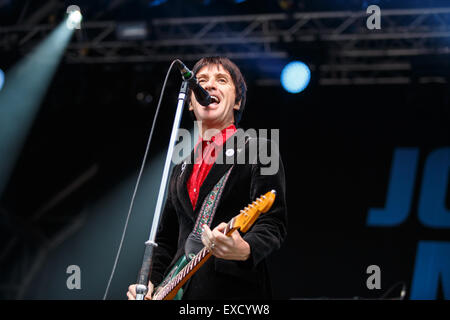 Manchester, UK. 11th July 2015. Former The Smiths guitarist Johnny Marr performs live at Castlefield Bowl as part of the Summer In The City festival supporting Noel Gallagher's High Flying Birds. Credit:  Simon Newbury/Alamy Live News Stock Photo