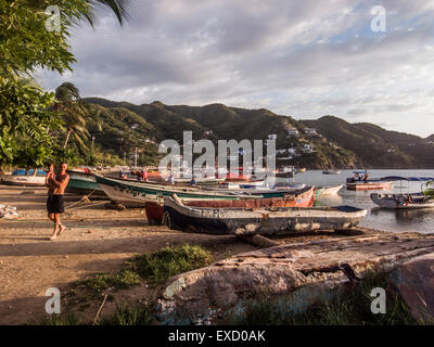 Sunset on the beach at Taganga near Santa Marta, Colombia.   The once small fishing village on the Caribbean has become a popula Stock Photo