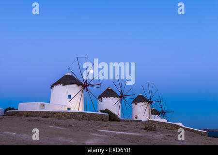 The Mykonos windmills are iconic feature of the Greek island of the Mykonos. Stock Photo