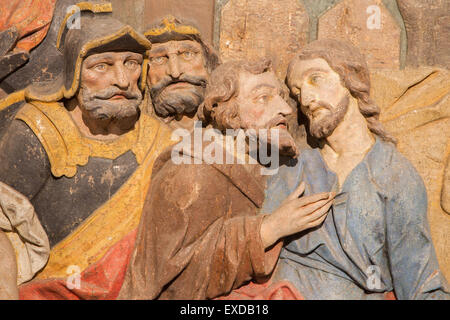 BANSKA STIAVNICA, SLOVAKIA - FEBRUARY 5, 2015: The detail of carved relief of Betrayal of Judas as the part of baroque Calvary f Stock Photo