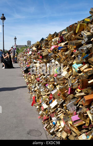 Love locks, lockers, symbolizing forever lasting love, at Pont de l'Archeveche Paris, France. Stock Photo