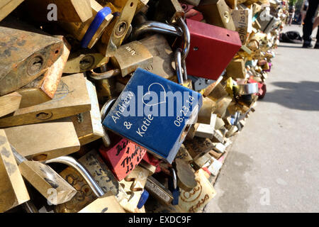 Love locks, lockers, symbolizing forever lasting love, at Pont de l'Archeveche, Paris, France. Stock Photo