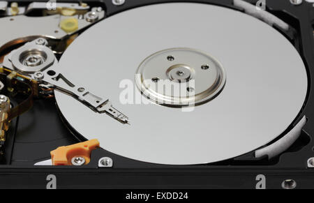 Computer hard disk drive with magnetic head. Stock Photo