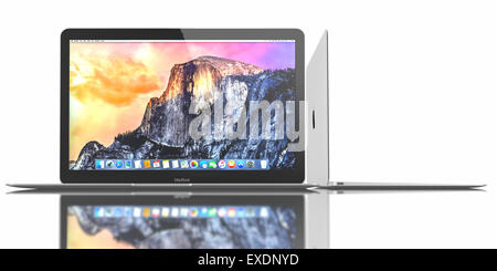 New Silver MacBook displaying OS X Yosemite. It has a 12-inch Retina display with a resolution of 2304 x 1440. Stock Photo