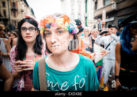 MILAN, ITALY - JUNE 29: gay pride manifestation in Milan June 29, 2013. Normal people, gay, lesbians, transgenders and bisexuals take to the street for their rights organizing a street parade party Stock Photo