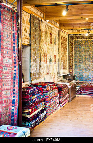 Inside of a store selling traditional rugs and carpets in Turkey