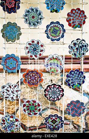 Ceramic souvenir coasters on sale at a store in Turkey Stock Photo
