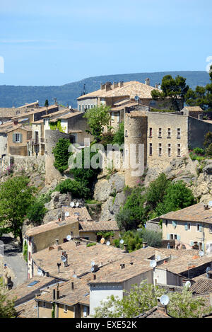 View of the Provençal Perched Village of Menerbes and its Château in the Luberon Regional Park Vaucluse Provence France Stock Photo