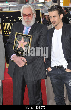 LOS ANGELES, CA - JANUARY 26, 2011: Donald Sutherland & Colin Farrell on Hollywood Boulevard where Sutherland was honored with the 2,430th star on the Hollywood Walk of Fame today. Stock Photo