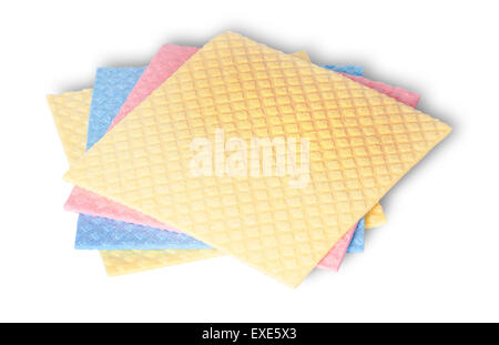 Stack of multicolored sponges for dishwashing isolated on white background Stock Photo