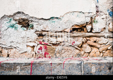 Part of a an external wall which has been damaged Stock Photo