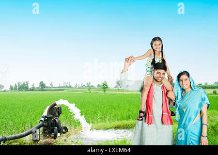 indian Rural Parents with Daughter farm enjoy Stock Photo
