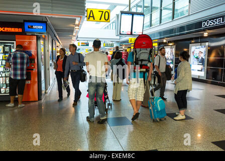 Dusseldorf, Germany, Tourists Walking in Hallway at International German Airport, crowded airport europe Stock Photo