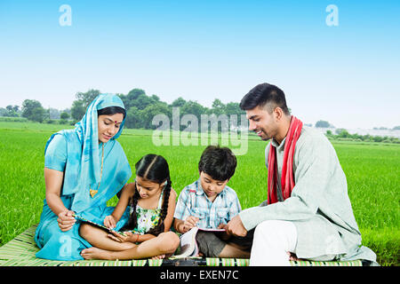 indian Rural Parents farm Teaching kids Stock Photo