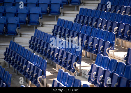 Empty blue seat of a football stadium Stock Photo