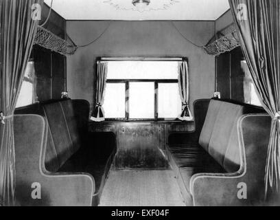 The interior of the passenger cabin of the LZ 127 Graf Zeppelin, a German airship used for luxury travel in the 1920s, presenting its sophisticated design and aviation history. Stock Photo