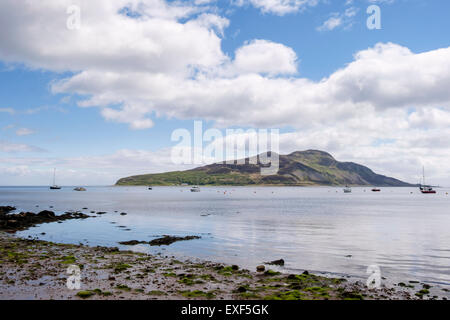 View across calm sea to Holy Island offshore from Lamlash, Isle of Arran, North Ayrshire, Strathclyde, Scotland, UK, Britain Stock Photo