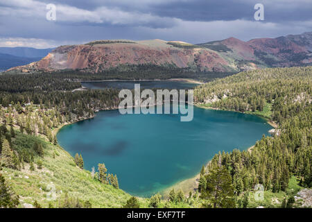 Summer storm growing above Lake Mary and Lake George in California's Sierra Nevada Mammoth Lakes. Stock Photo