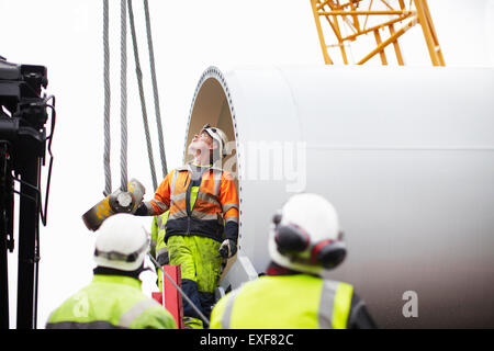 Engineers working on wind turbine Stock Photo