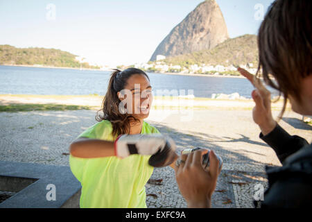 Female boxer training with personal trainer, Rio De Janeiro, Brazil Stock Photo
