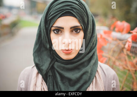 Close up portrait of young woman wearing hijab Stock Photo